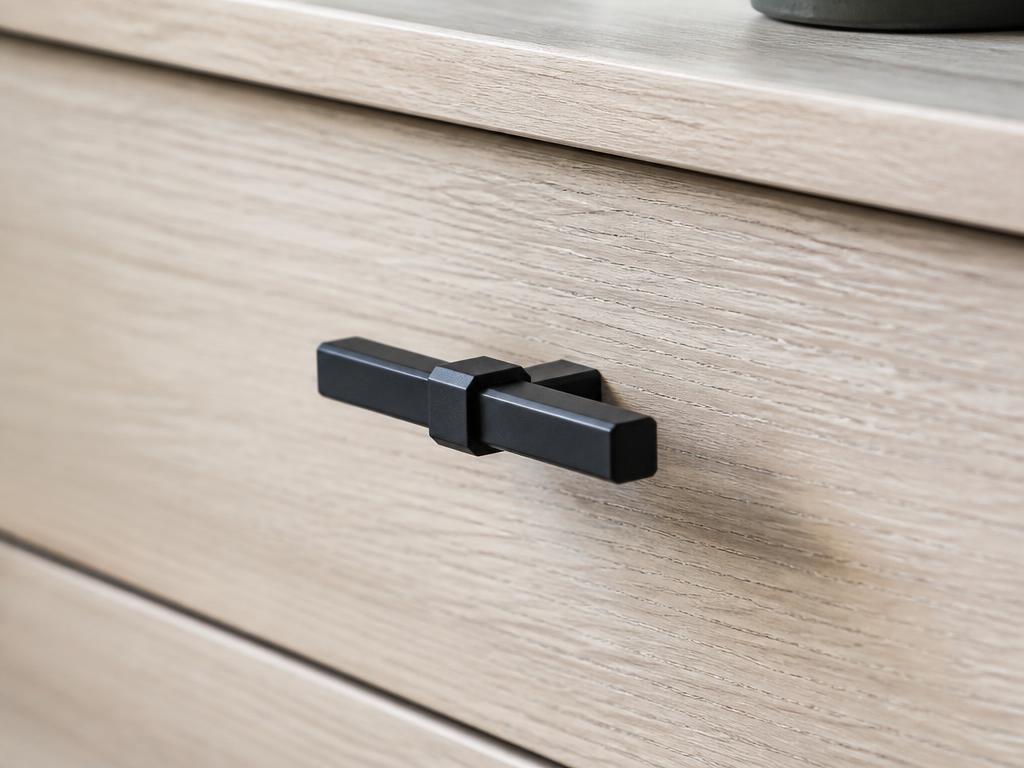 DK025BL matt black square T-knob fitted to a pale oak drawer front